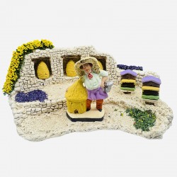 La rûche et l'apiculteur
